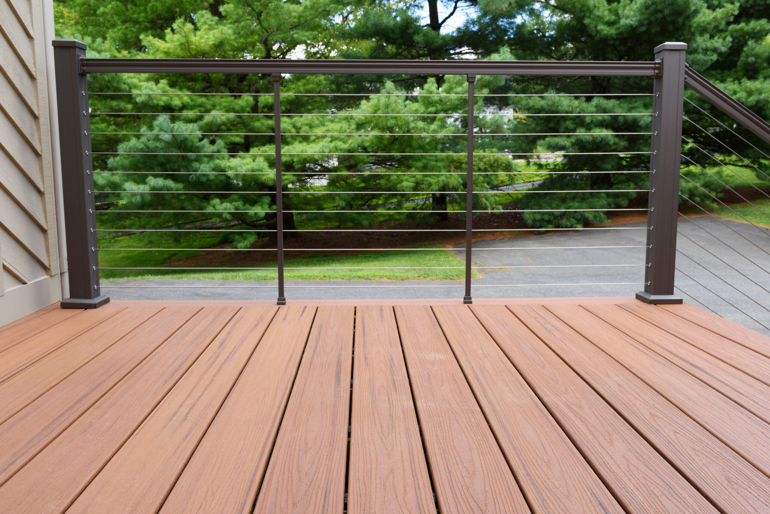 Trex decking with metal wire railings from a Deck Builder in Marlborough MA
