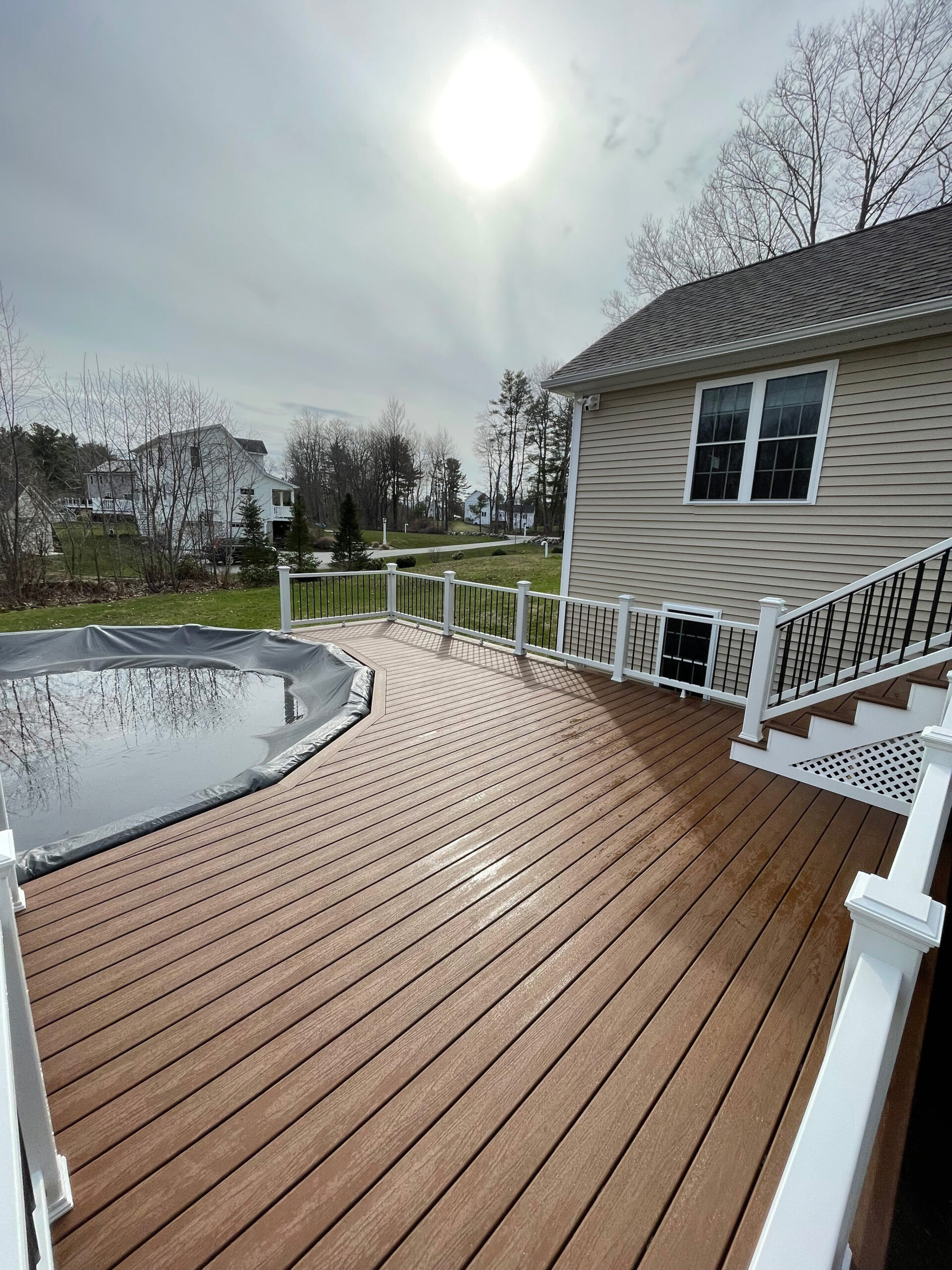 Trex company saddle composite decking around an above ground pool