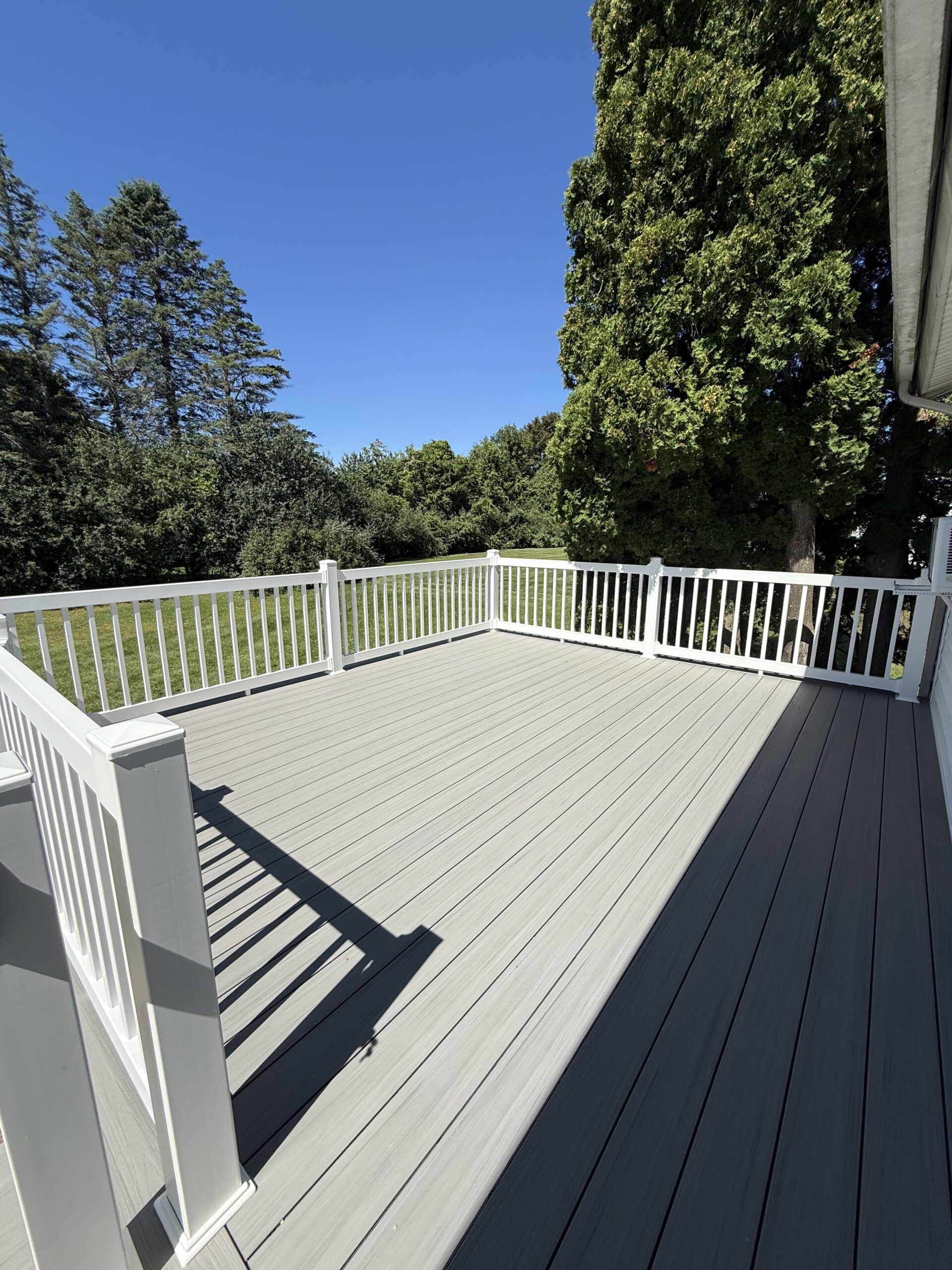 Grey decking with white railings